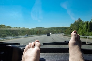 Feet on dashboard